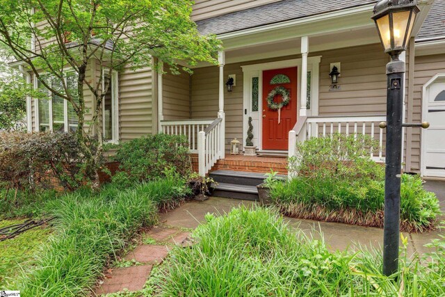 304 Oak Brook Way, Taylors, SC 29687 - property entrance with a porch and a garage