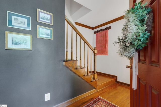 304 Oak Brook Way, Taylors, SC 29687 - staircase with wood finished floors, baseboards, and ornamental molding