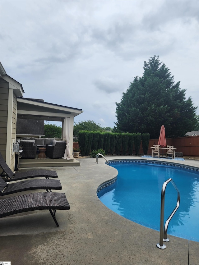 256 Chickadee Trl, Easley, SC 29642 - view of swimming pool with an outdoor hangout area, a patio, and a fenced backyard