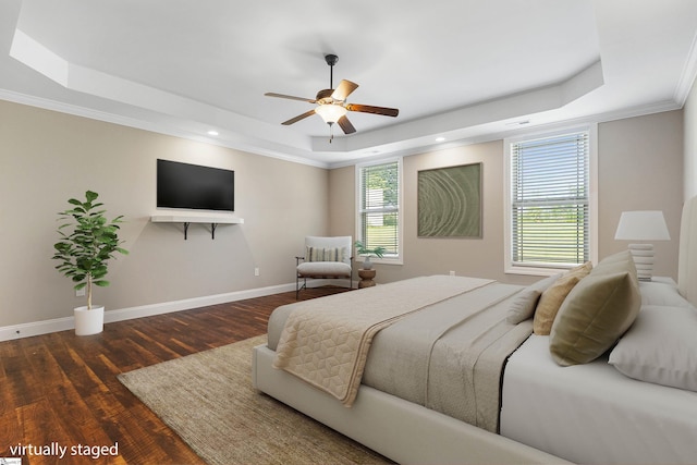 121 Floyd Meadow Dr, Inman, SC 29349 - bedroom featuring a tray ceiling, multiple windows, wood finished floors, ornamental molding, and baseboards