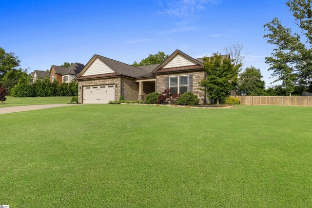 121 Floyd Meadow Dr, Inman, SC 29349 - view of front of home featuring an attached garage, driveway, and stone siding