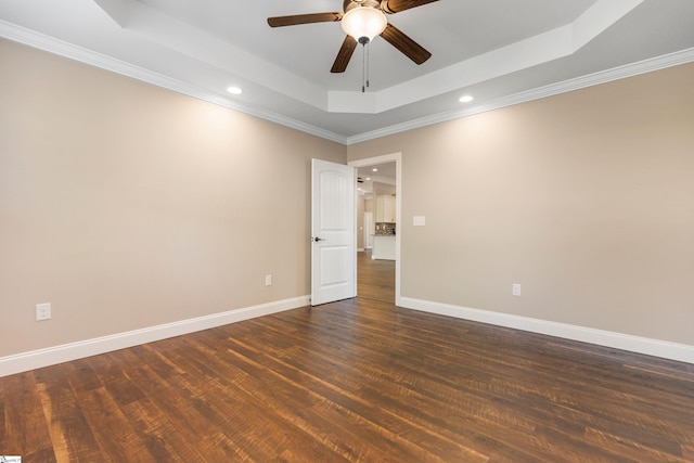 121 Floyd Meadow Dr, Inman, SC 29349 - spare room featuring a raised ceiling, ceiling fan, recessed lighting, dark wood-type flooring, and baseboards