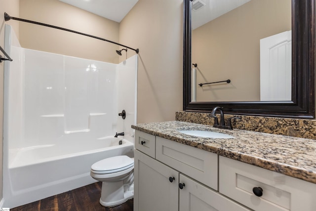 121 Floyd Meadow Dr, Inman, SC 29349 - bathroom with toilet, vanity, washtub / shower combination, and wood finished floors