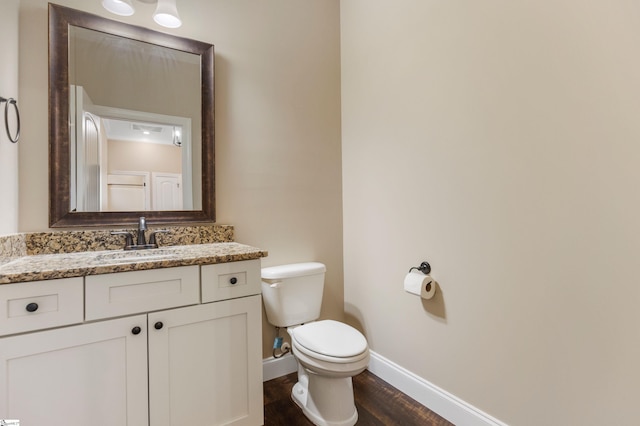 121 Floyd Meadow Dr, Inman, SC 29349 - bathroom with toilet, baseboards, wood finished floors, and vanity
