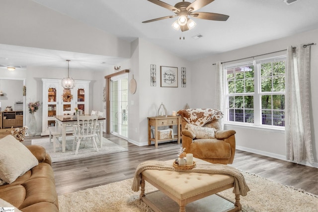 137 Mediterranean Ave, Anderson, SC 29621 - living room featuring lofted ceiling, healthy amount of natural light, ceiling fan, wood finished floors, and baseboards