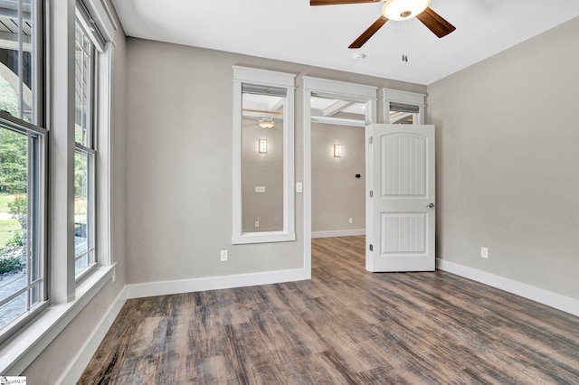 1061 Hidden Glory Dr, Landrum, SC 29356 - spare room with ceiling fan, plenty of natural light, wood finished floors, and baseboards