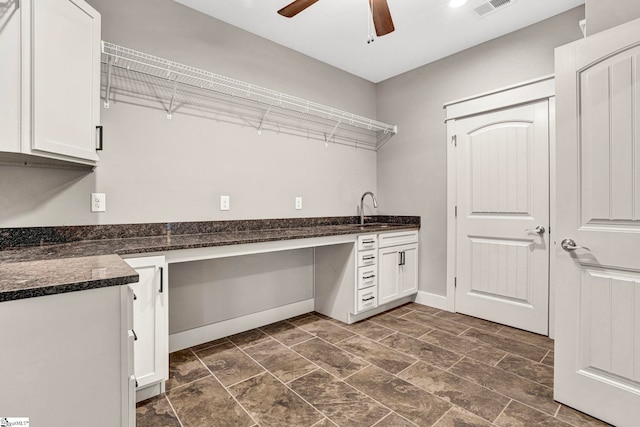 1061 Hidden Glory Dr, Landrum, SC 29356 - laundry room with a ceiling fan, a sink, and baseboards