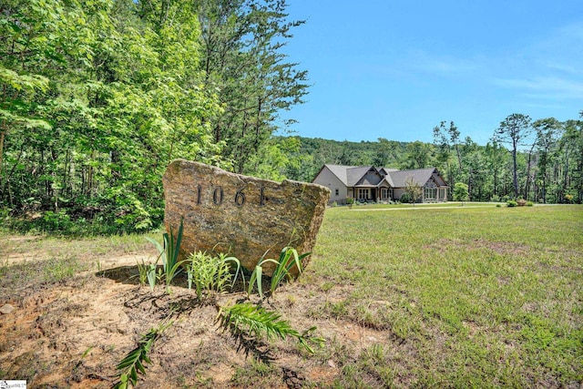 1061 Hidden Glory Dr, Landrum, SC 29356 - view of grassy yard with a wooded view