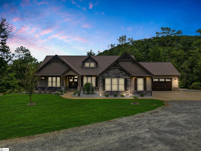 1061 Hidden Glory Dr, Landrum, SC 29356 - craftsman house featuring stone siding, concrete driveway, a garage, and a front yard