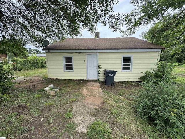 403 Duckett St, Laurens, SC 29360 - rear view of property with a chimney