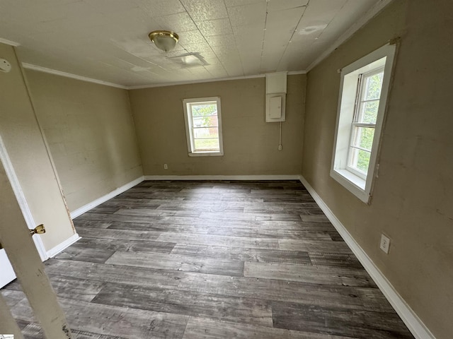 403 Duckett St, Laurens, SC 29360 - empty room with crown molding, wood finished floors, and baseboards