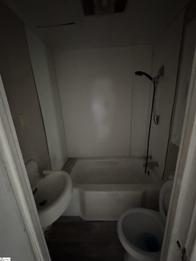403 Duckett St, Laurens, SC 29360 - bathroom featuring toilet and  shower combination