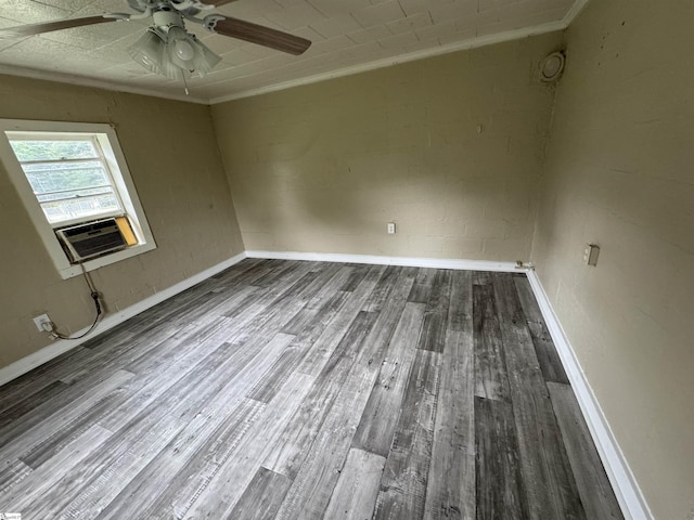 403 Duckett St, Laurens, SC 29360 - unfurnished room featuring ornamental molding, cooling unit, wood finished floors, a ceiling fan, and baseboards