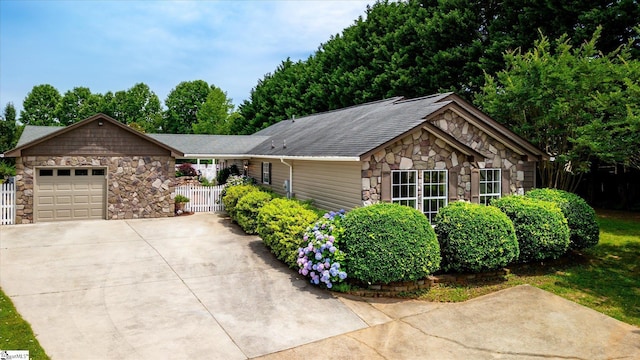 1783 Brockman Mcclimon Rd, Greer, SC 29651 - ranch-style house featuring stone siding, driveway, a garage, and a shingled roof