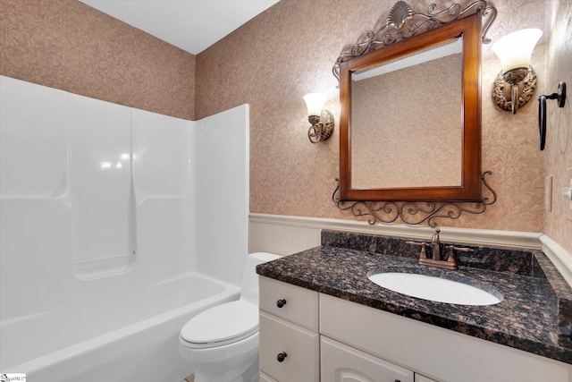 1783 Brockman Mcclimon Rd, Greer, SC 29651 - bathroom with wallpapered walls, vanity, toilet, wainscoting, and shower / tub combination