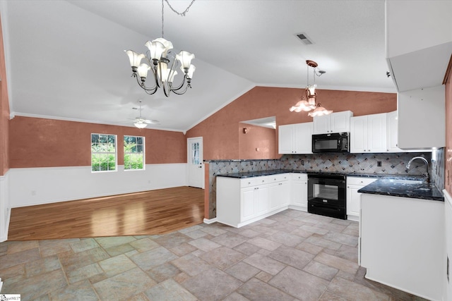1783 Brockman Mcclimon Rd, Greer, SC 29651 - kitchen featuring black appliances, a chandelier, a peninsula, vaulted ceiling, and a sink