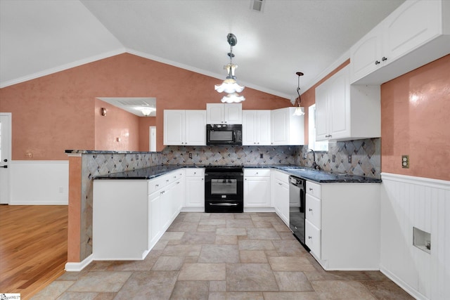 1783 Brockman Mcclimon Rd, Greer, SC 29651 - kitchen featuring black appliances, lofted ceiling, a sink, a peninsula, and white cabinetry