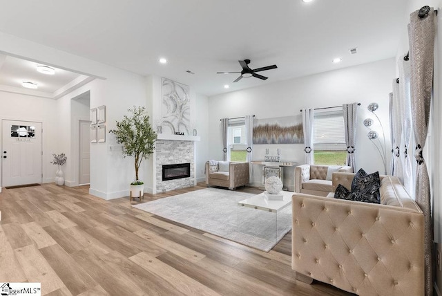 223 R C Thompson Rd, Chesnee, SC 29323 - living area featuring a stone fireplace, a ceiling fan, light wood-style flooring, recessed lighting, and baseboards