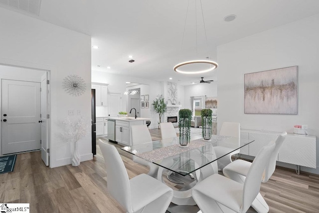 223 R C Thompson Rd, Chesnee, SC 29323 - dining area with light wood-style floors, a ceiling fan, and recessed lighting