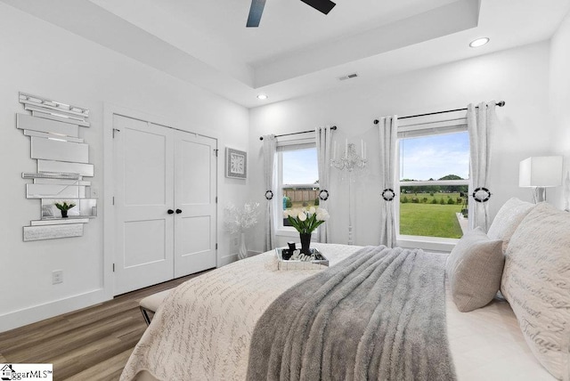 223 R C Thompson Rd, Chesnee, SC 29323 - bedroom featuring recessed lighting, wood finished floors, baseboards, ceiling fan, and a raised ceiling