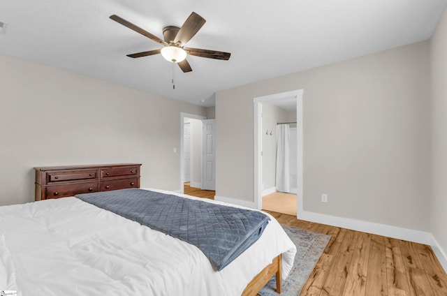 7 Slate Ln, Greer, SC 29650 - bedroom with wood finished floors, baseboards, ensuite bath, and ceiling fan
