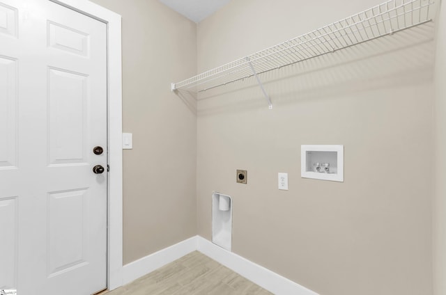 7 Slate Ln, Greer, SC 29650 - washroom featuring hookup for an electric dryer, baseboards, light wood-style flooring, and hookup for a washing machine