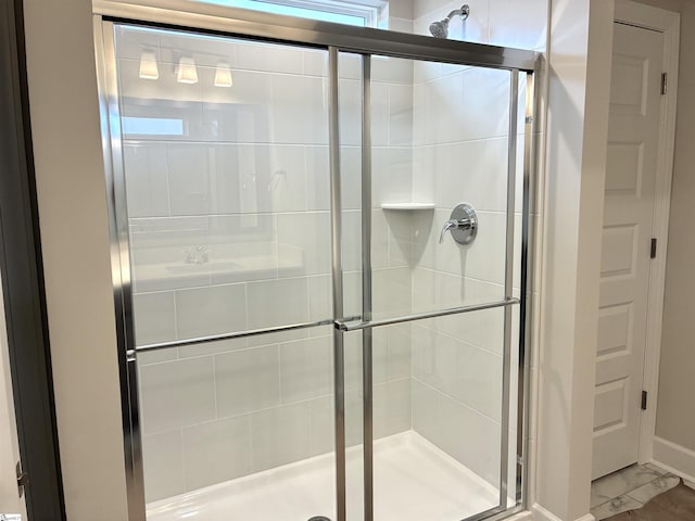 213 Fenner Pl, Greenville, SC 29607 - bathroom with a stall shower and marble finish flooring