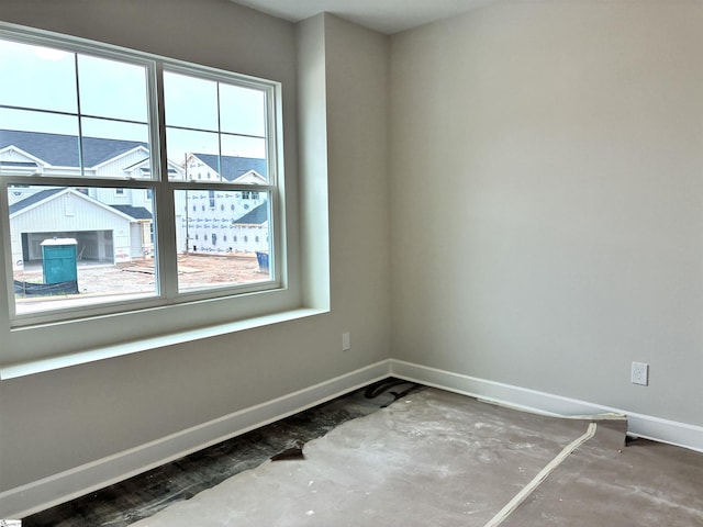 213 Fenner Pl, Greenville, SC 29607 - empty room with baseboards and healthy amount of natural light