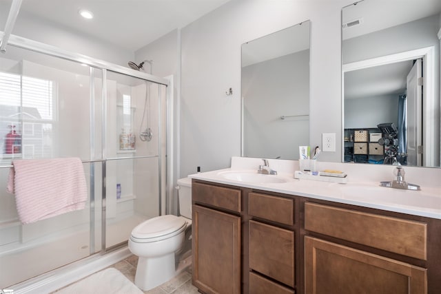 841 Speakeasy Ln, Inman, SC 29349 - bathroom with a shower stall, double vanity, toilet, tile patterned floors, and recessed lighting