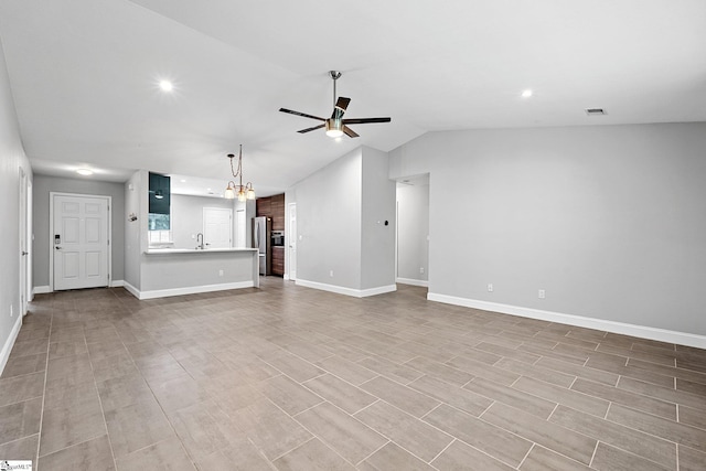 3 Alewine Ct, Taylors, SC 29687 - unfurnished living room with a ceiling fan, a sink, baseboards, vaulted ceiling, and recessed lighting