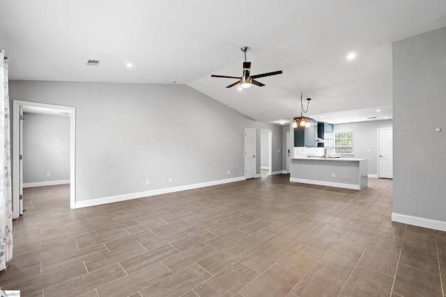 3 Alewine Ct, Taylors, SC 29687 - unfurnished living room with ceiling fan, baseboards, a sink, vaulted ceiling, and recessed lighting
