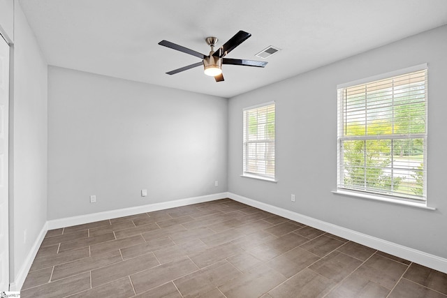 3 Alewine Ct, Taylors, SC 29687 - spare room with a ceiling fan and baseboards