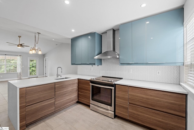 3 Alewine Ct, Taylors, SC 29687 - kitchen featuring wall chimney range hood, stainless steel range with electric stovetop, a sink, modern cabinets, and a peninsula