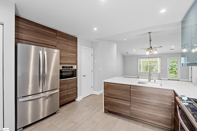3 Alewine Ct, Taylors, SC 29687 - kitchen with appliances with stainless steel finishes, a sink, modern cabinets, recessed lighting, and light countertops