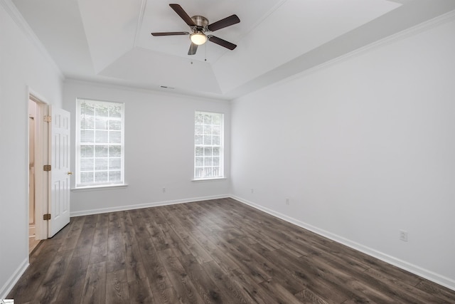 16 Glenbow Ct, Simpsonville, SC 29680 - empty room featuring a raised ceiling, dark wood-style floors, a ceiling fan, and baseboards
