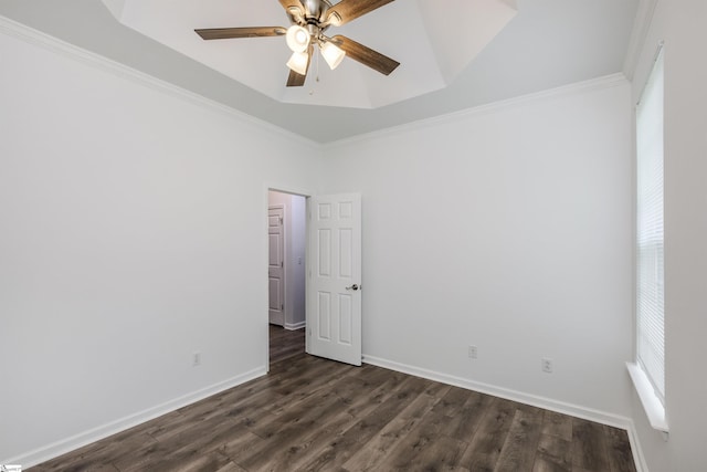 16 Glenbow Ct, Simpsonville, SC 29680 - unfurnished room with dark wood-style flooring, a ceiling fan, baseboards, crown molding, and a raised ceiling
