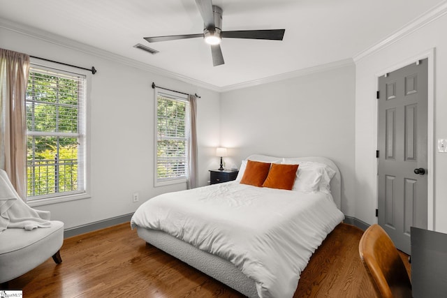 213 Old House Way, Simpsonville, SC 29681 - bedroom featuring wood finished floors, ornamental molding, baseboards, and a ceiling fan