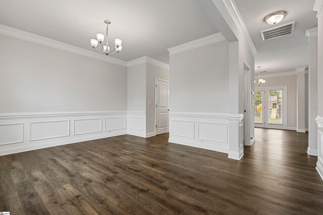 122 Rivermill Pl, Piedmont, SC 29673 - unfurnished dining area featuring a chandelier, crown molding, dark wood-style floors, and a wainscoted wall