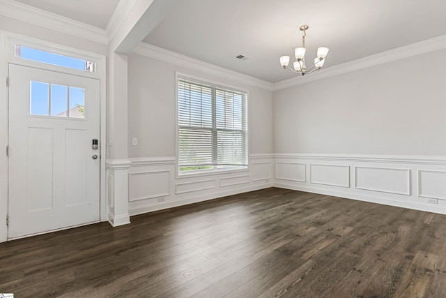 122 Rivermill Pl, Piedmont, SC 29673 - foyer entrance featuring a chandelier, wainscoting, dark wood-type flooring, and ornamental molding