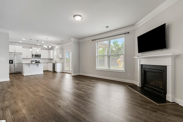 122 Rivermill Pl, Piedmont, SC 29673 - unfurnished living room featuring ornamental molding, recessed lighting, dark wood-style flooring, a fireplace, and baseboards