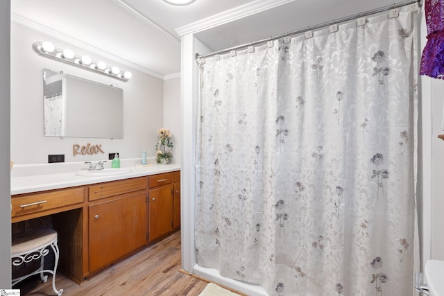 1 Baldwin St, Pelzer, SC 29669 - bathroom featuring vanity, crown molding, wood finished floors, and a shower with curtain