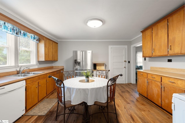 1 Baldwin St, Pelzer, SC 29669 - kitchen with dishwasher, stainless steel fridge with ice dispenser, a sink, light wood-style floors, and brown cabinets