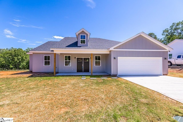 411 Wyatt Rd, Piedmont, SC 29673 - view of front of property featuring an attached garage, a front yard, covered porch, and concrete driveway