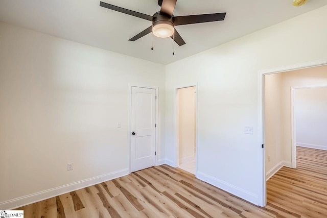 411 Wyatt Rd, Piedmont, SC 29673 - unfurnished bedroom with light wood-type flooring, baseboards, and a ceiling fan