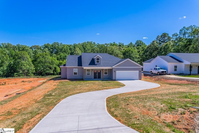411 Wyatt Rd, Piedmont, SC 29673 - view of front of home featuring a front yard, concrete driveway, and an attached garage