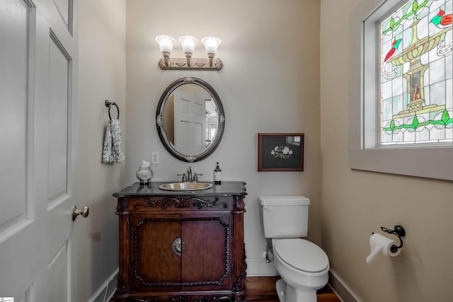 251 W Mcelhaney Rd, Taylors, SC 29687 - half bath with toilet, vanity, and baseboards