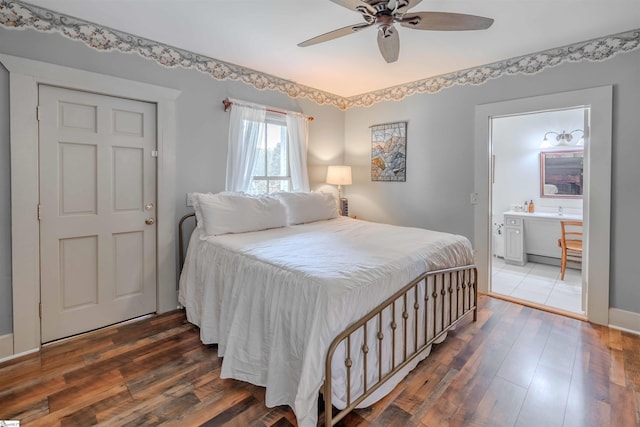 251 W Mcelhaney Rd, Taylors, SC 29687 - bedroom featuring hardwood / wood-style floors, ensuite bath, a ceiling fan, and baseboards