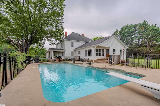 251 W Mcelhaney Rd, Taylors, SC 29687 - view of swimming pool featuring a patio area, a hot tub, and a diving board