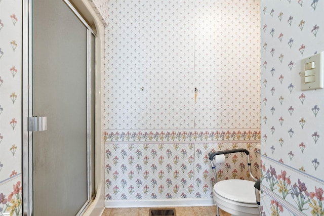 11 Midland Ct, Taylors, SC 29687 - full bathroom with wallpapered walls, a shower stall, and toilet