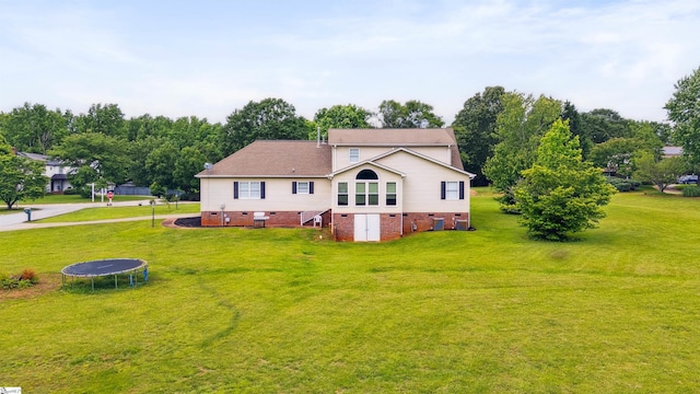11 Midland Ct, Taylors, SC 29687 - view of home's exterior with crawl space, a trampoline, and a yard